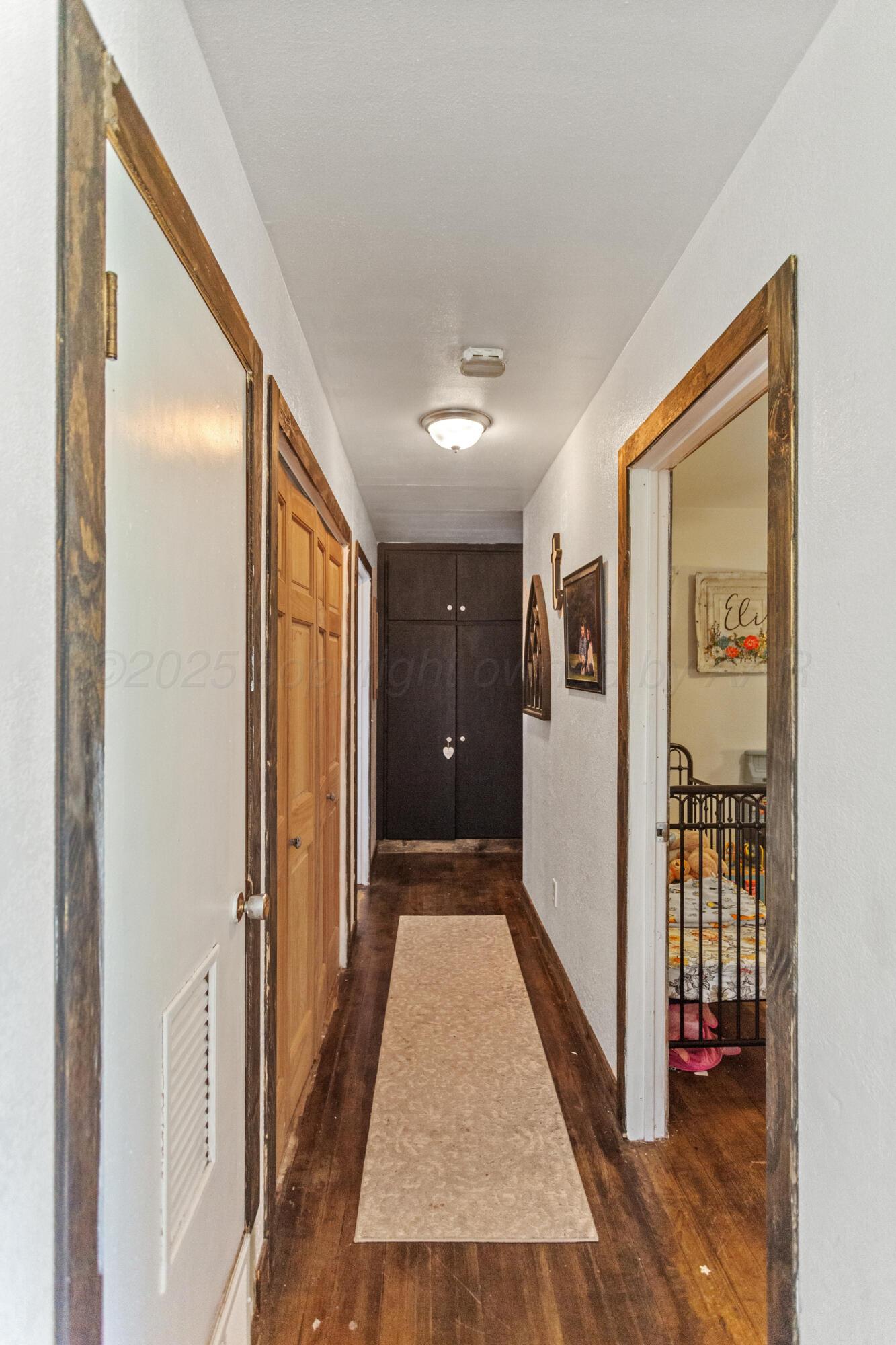 920 South Madden Street Shamrock, TX 79079 - Photo 27 of 39 a view of gallery with wooden floor