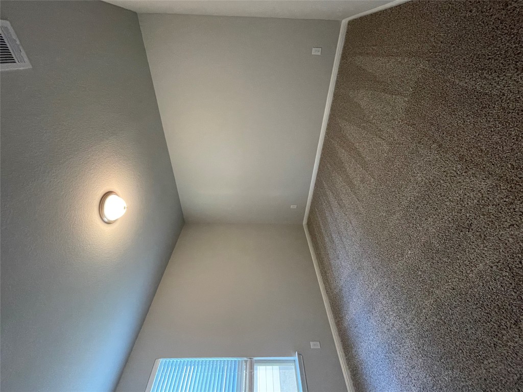 133 Old Stagecoach Road Jarrell, TX 76537 - Photo 11 of 23 an empty room with a empty space and window