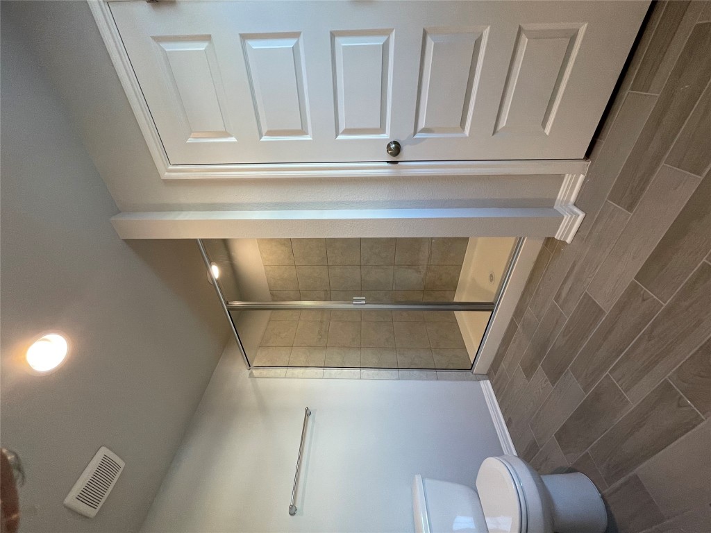 133 Old Stagecoach Road Jarrell, TX 76537 - Photo 16 of 23 a bathroom with a shower