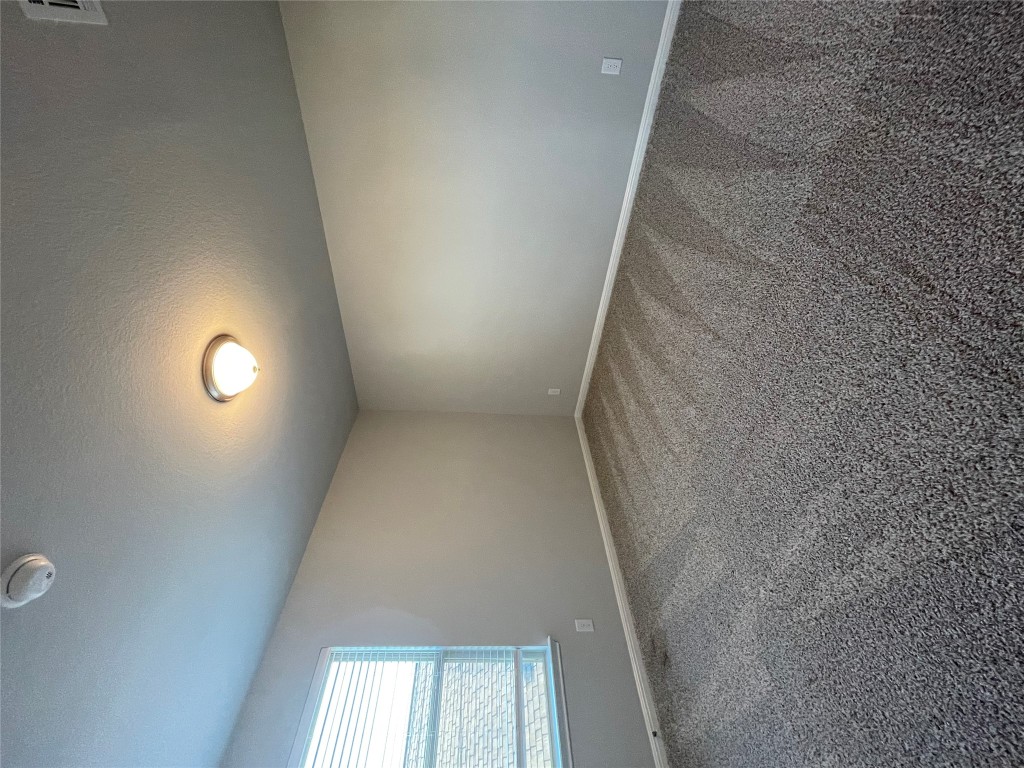 133 Old Stagecoach Road Jarrell, TX 76537 - Photo 18 of 23 an empty room with a empty space and window