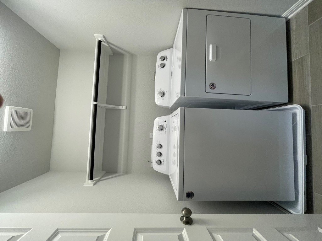 133 Old Stagecoach Road Jarrell, TX 76537 - Photo 20 of 23 a utility room with dryer and washer