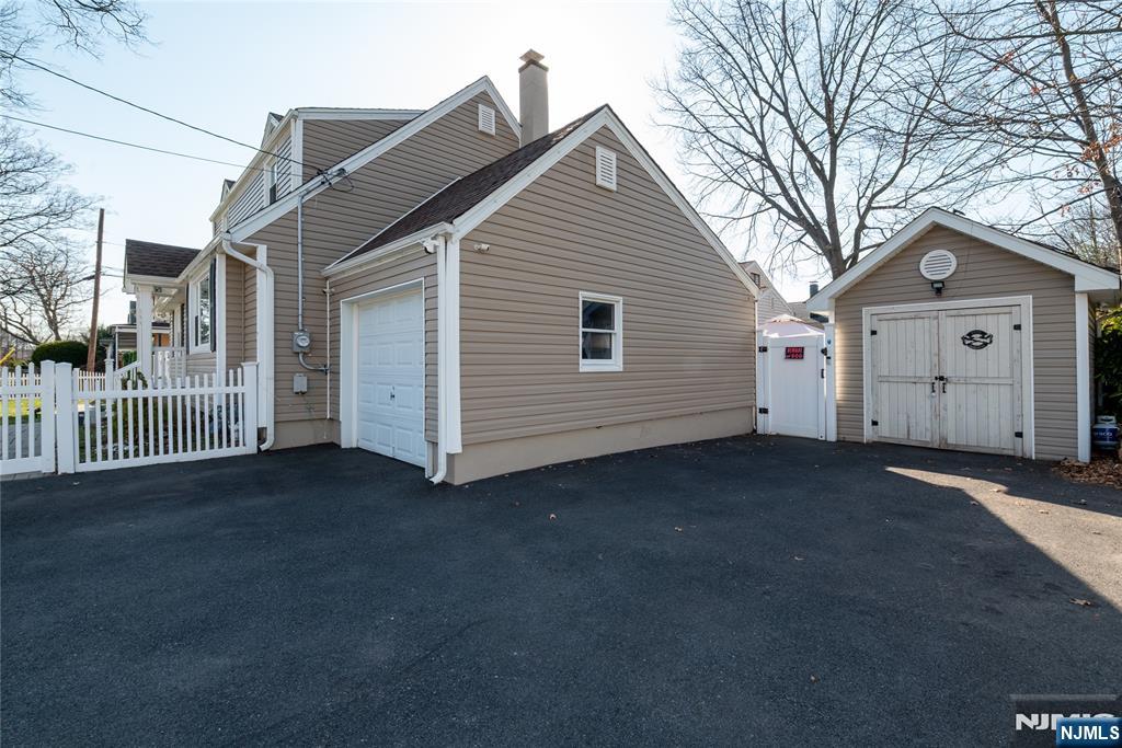 170 Tenafly Road Englewood, NJ 07631 - Photo 3 of 40 a view of a house with a yard