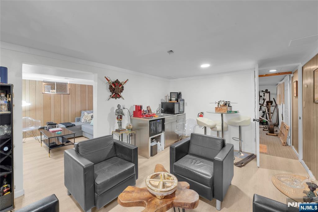 170 Tenafly Road Englewood, NJ 07631 - Photo 35 of 40 a living room with furniture and a table