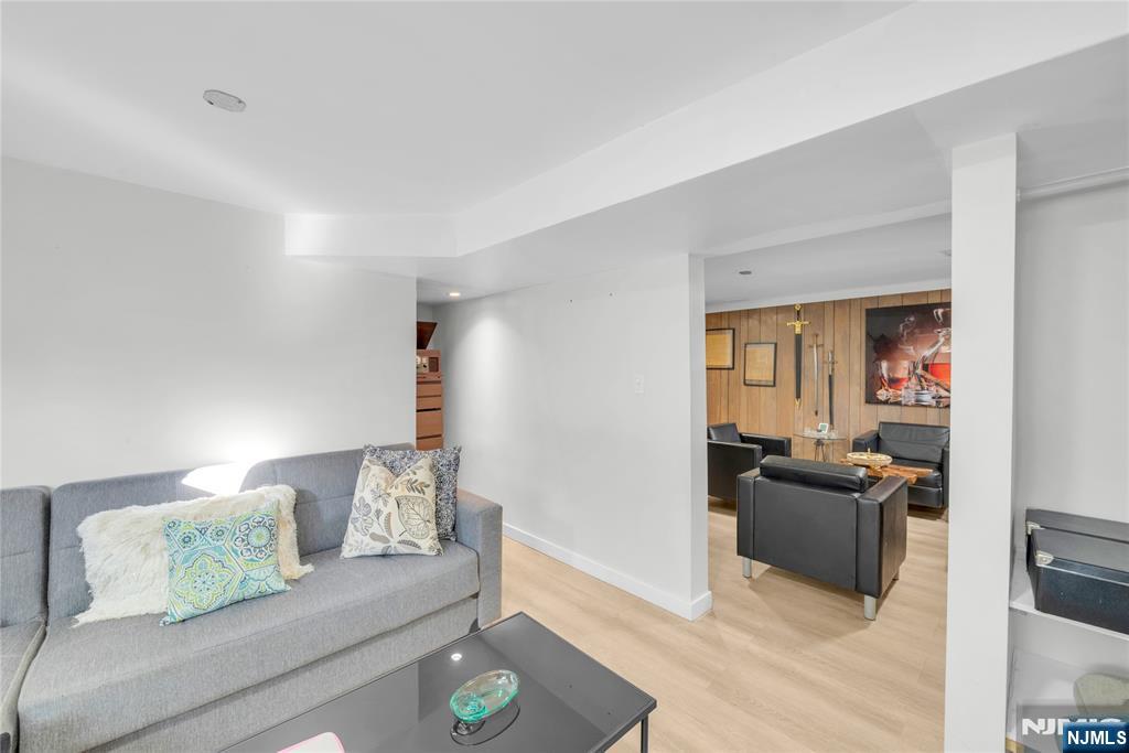 170 Tenafly Road Englewood, NJ 07631 - Photo 37 of 40 a living room with furniture and a couch