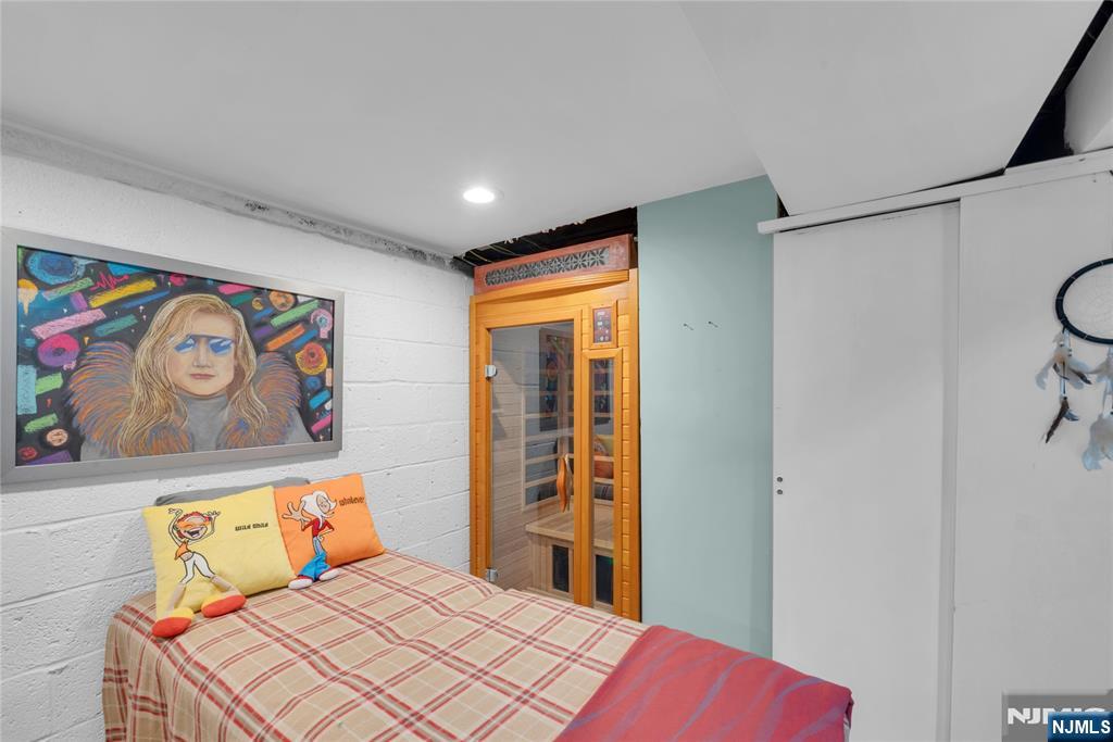 170 Tenafly Road Englewood, NJ 07631 - Photo 40 of 40 a bedroom with a bed and a window