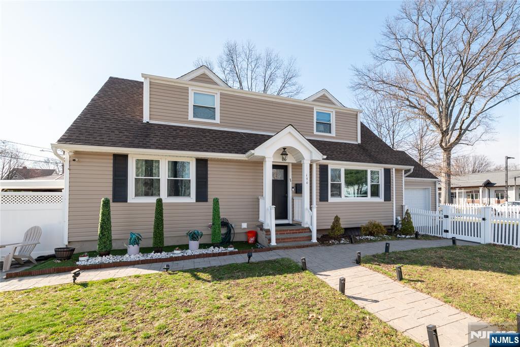 170 Tenafly Road Englewood, NJ 07631 - Photo 4 of 40 a front view of a house with swimming pool and furniture