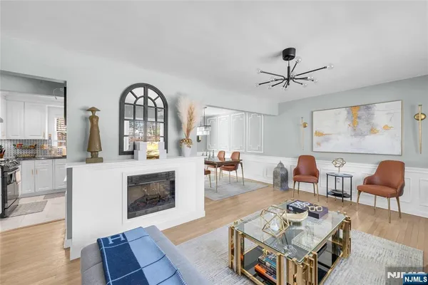 a living room with furniture and white walls