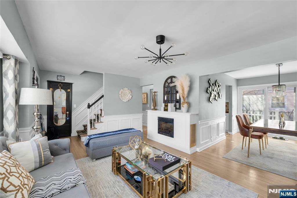 170 Tenafly Road Englewood, NJ 07631 - Photo 6 of 40 a living room with furniture and white walls