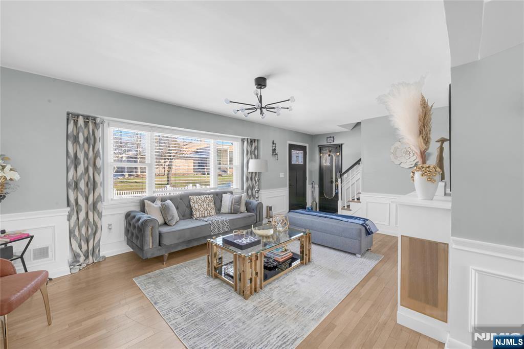 170 Tenafly Road Englewood, NJ 07631 - Photo 7 of 40 a living room with furniture and a large window