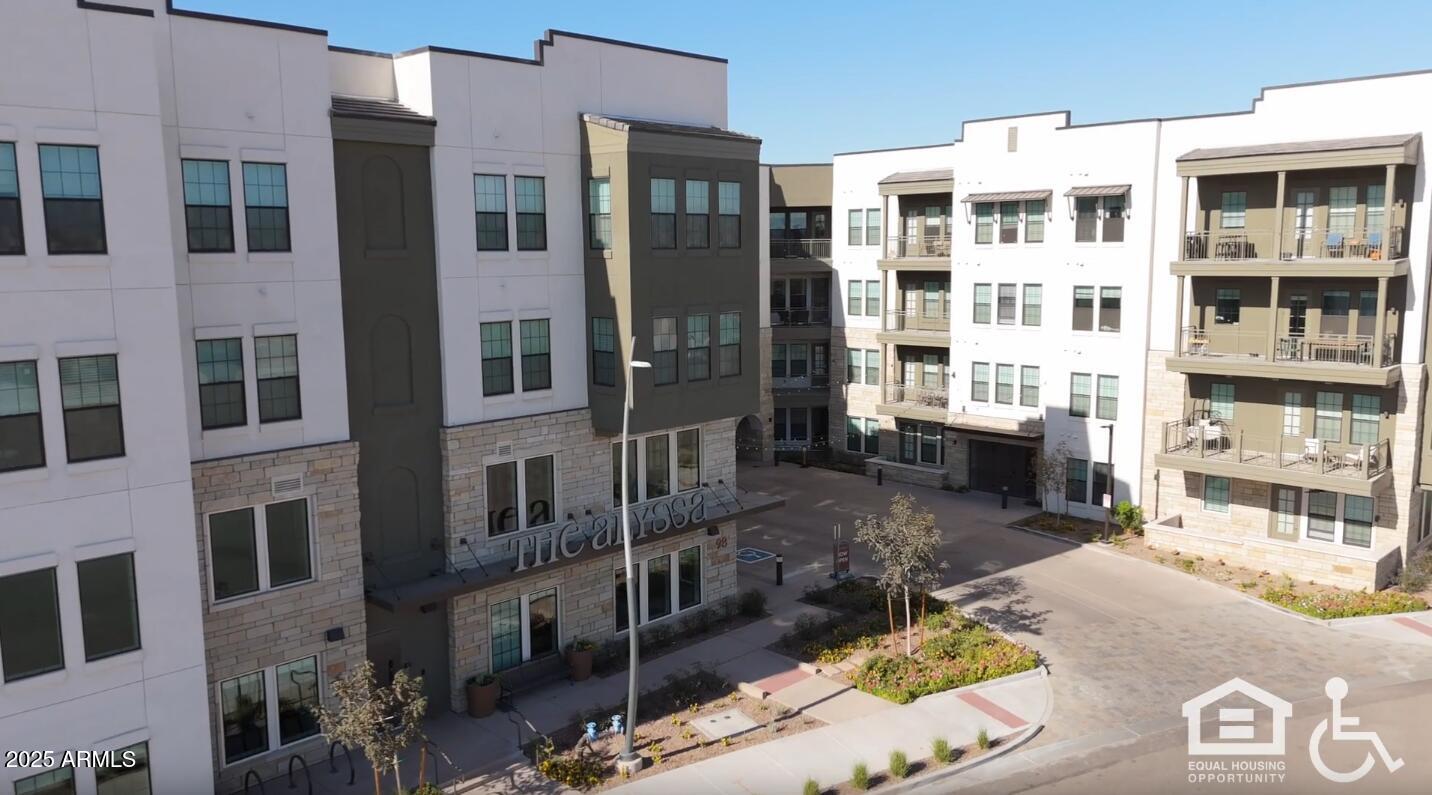 98 South River Drive, Unit C1 Tempe, AZ 85288 - Photo 1 of 20 a view of a building with a window
