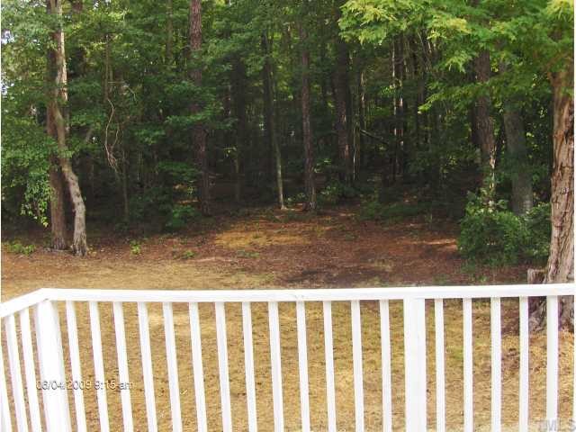 2339 Lucy Garrett Road Roxboro, NC 27574 - Photo 8 of 9 a view of a wooden fence
