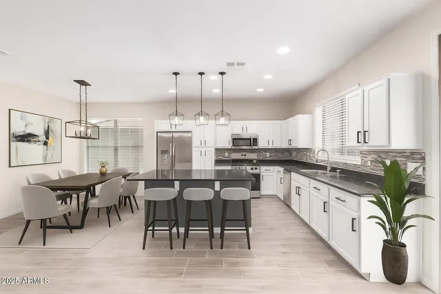 a large kitchen with lots of counter space and appliances
