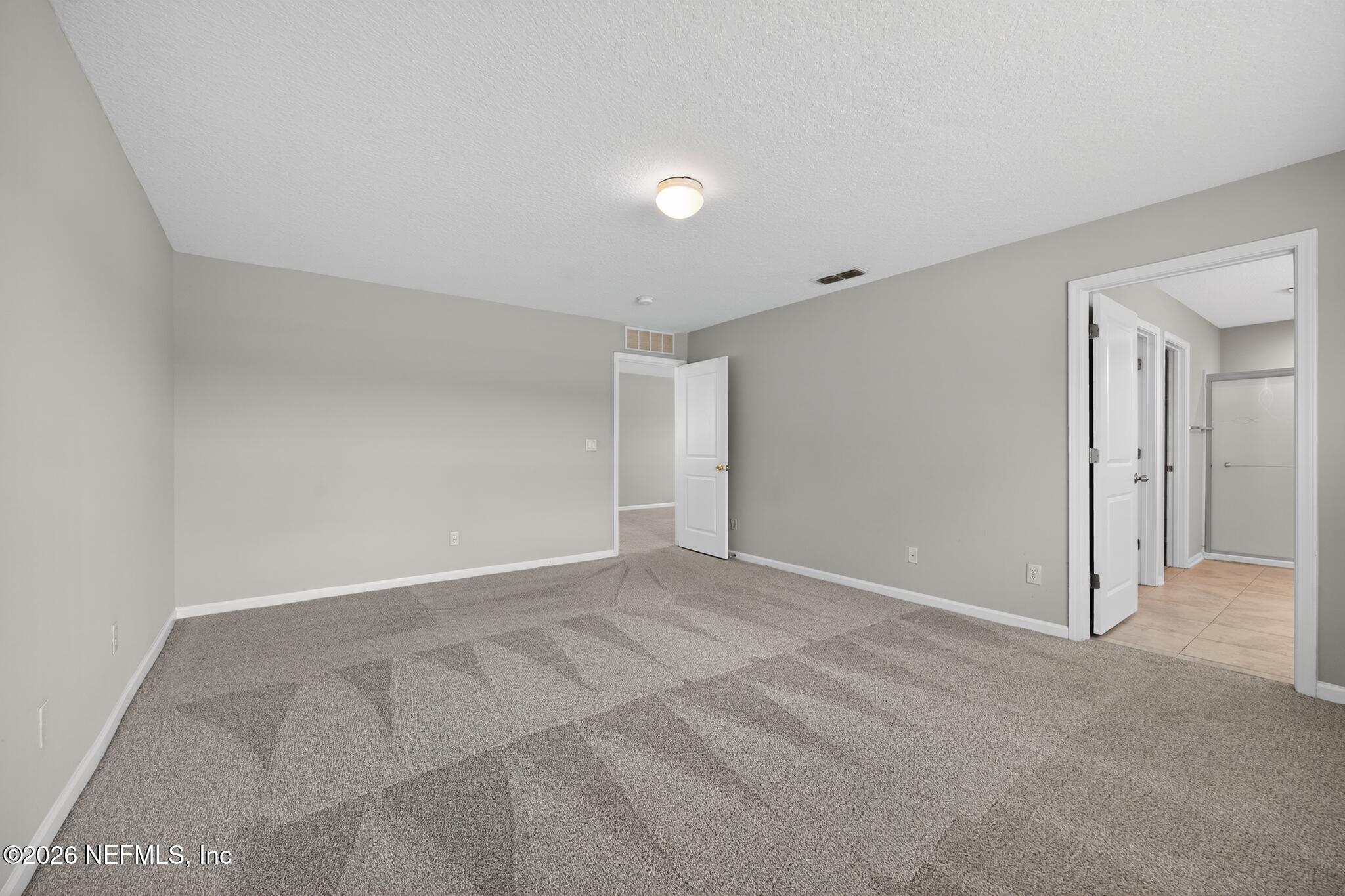 4818 Morning Rise Circle Jacksonville, FL 32218 - Photo 21 of 33 21_4818_Morning_Rise_Cir-Bedroom-8485