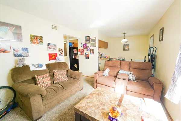 a living room with furniture and a couch