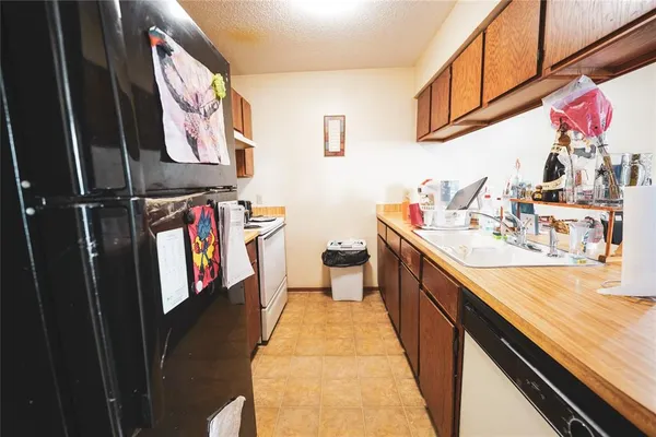 a hallway with washer and dryer