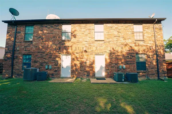 a view of a back yard from a patio