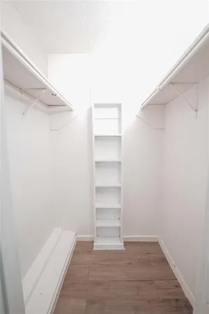 a view of an empty walk in closet