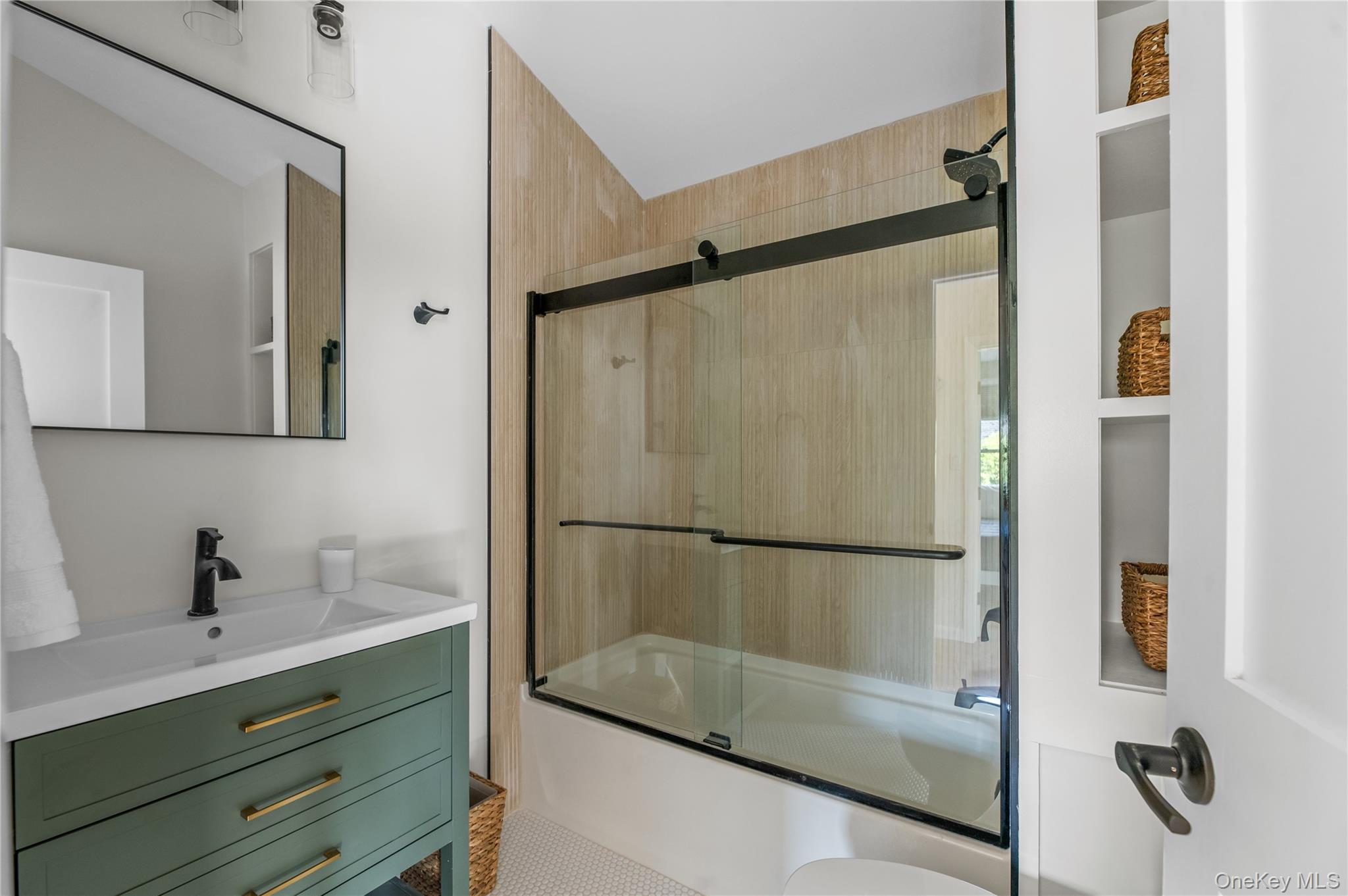 108 Ocean Road Ocean Beach, NY 11770 - Photo 20 of 23 a bathroom with a shower and a sink