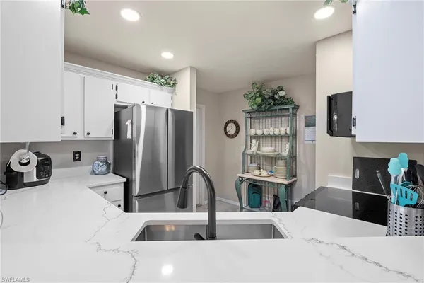 $5,900 | 153 Bristol Lane, Unit F102, Naples, FL 34112