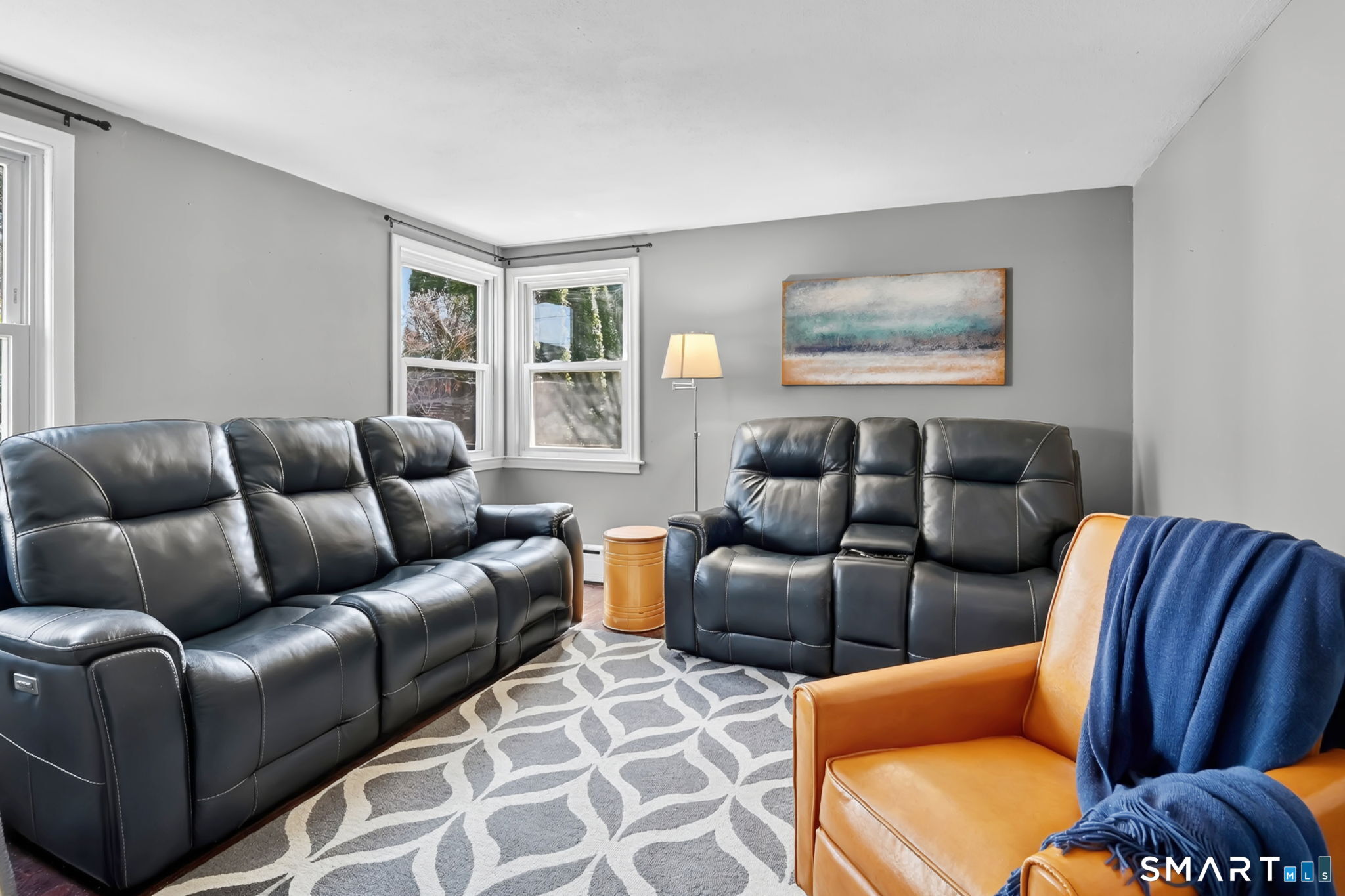 31 Somerset Street Wethersfield, CT 06109 - Photo 11 of 18 a living room with furniture and a couch