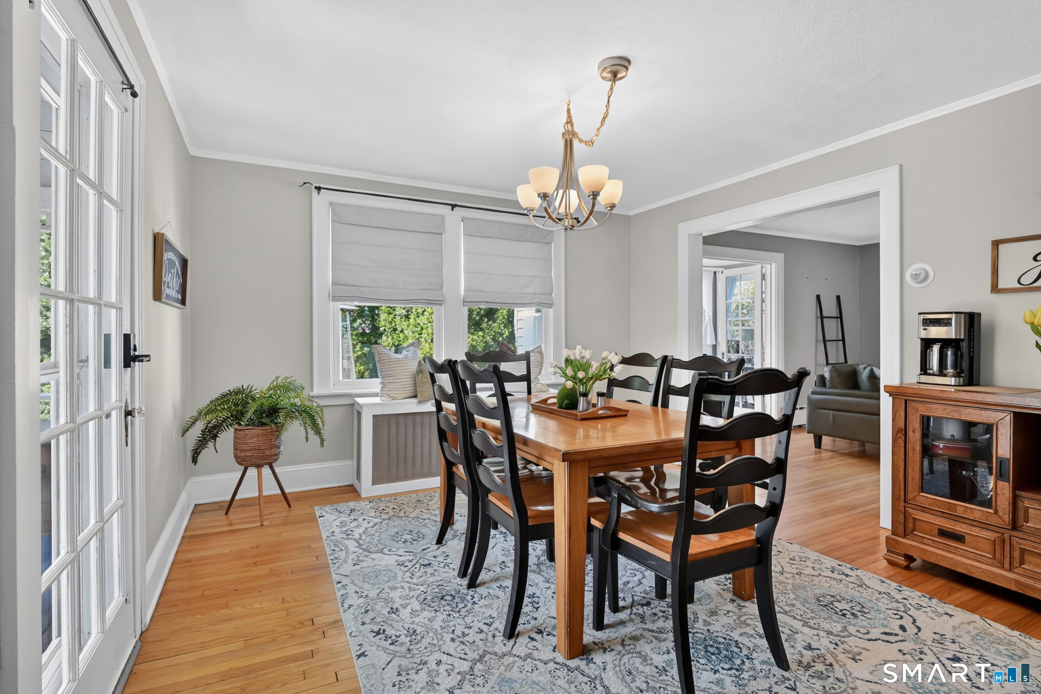 31 Somerset Street Wethersfield, CT 06109 - Photo 2 of 18 a view of a dining room with furniture window and wooden floor
