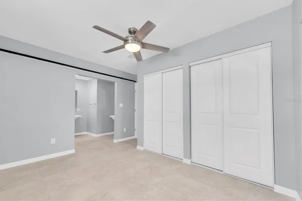 a bathroom with a sink a mirror and shower