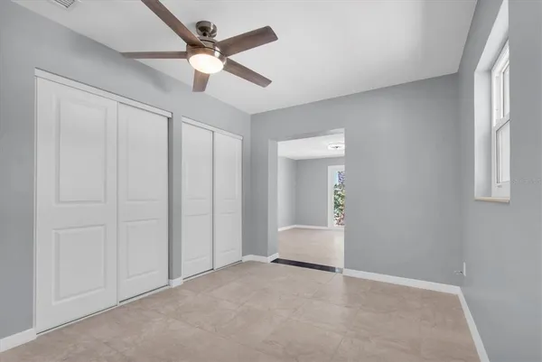 a bathroom with a sink toilet and a mirror