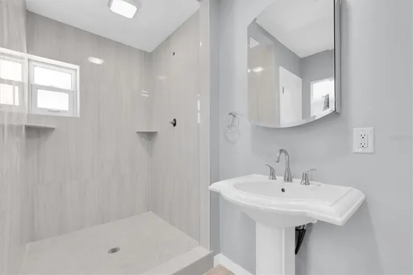 a view of an empty room with a window