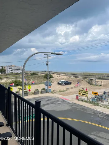a view of a balcony with an outdoor space