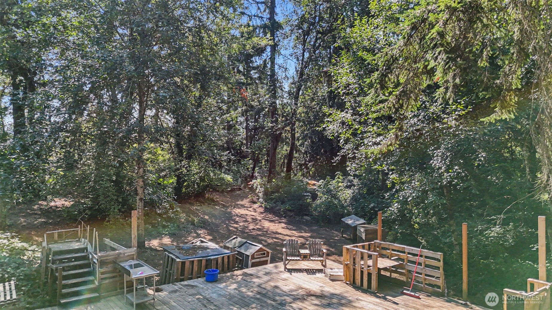 18220 70th St Court Southwest Longbranch, WA 98351 - Photo 15 of 21 a view of a chairs and table in the outdoor space