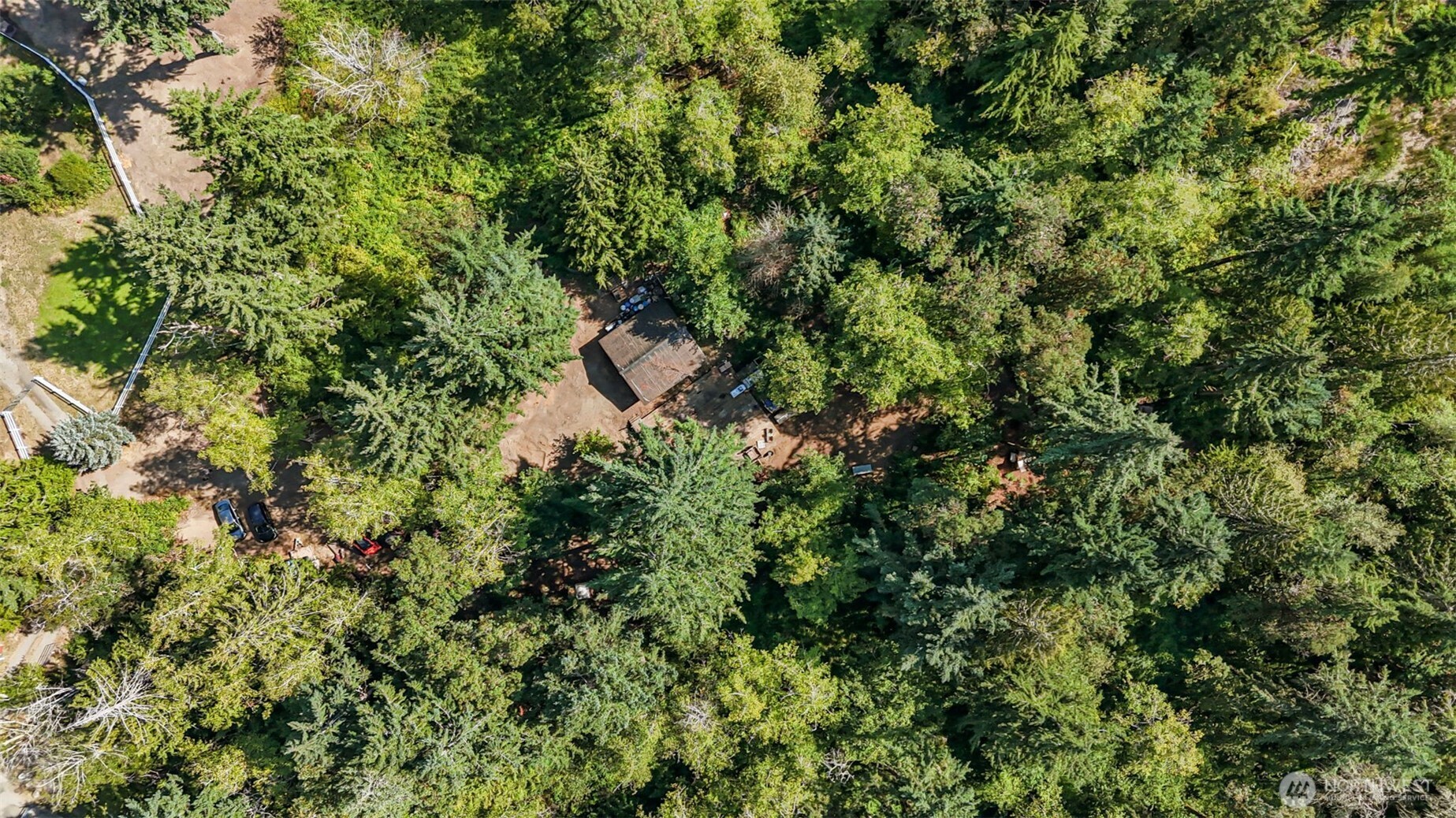 18220 70th St Court Southwest Longbranch, WA 98351 - Photo 18 of 21 a view of a house with a tree
