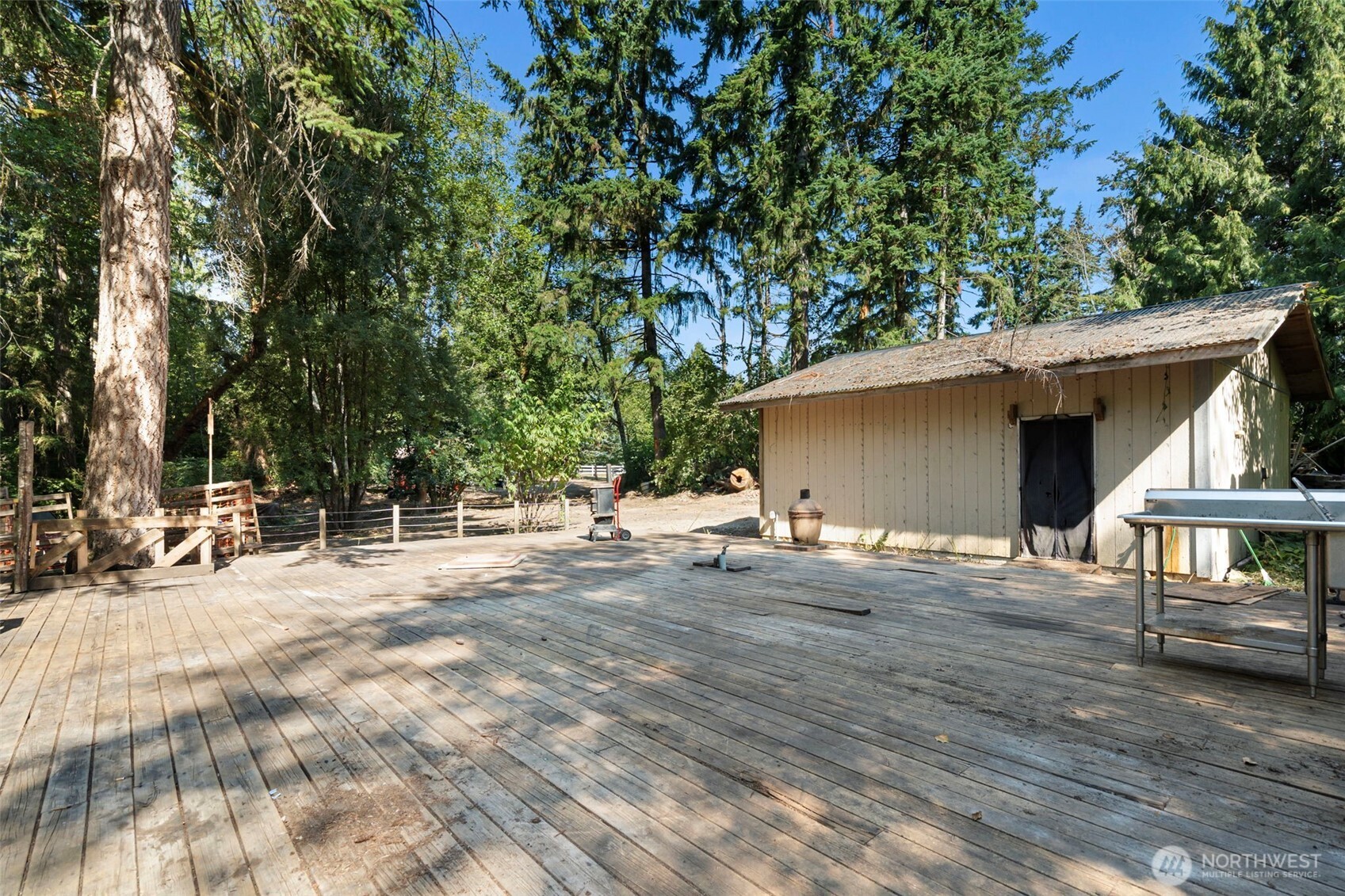 18220 70th St Court Southwest Longbranch, WA 98351 - Photo 10 of 21 a view of a house with a patio