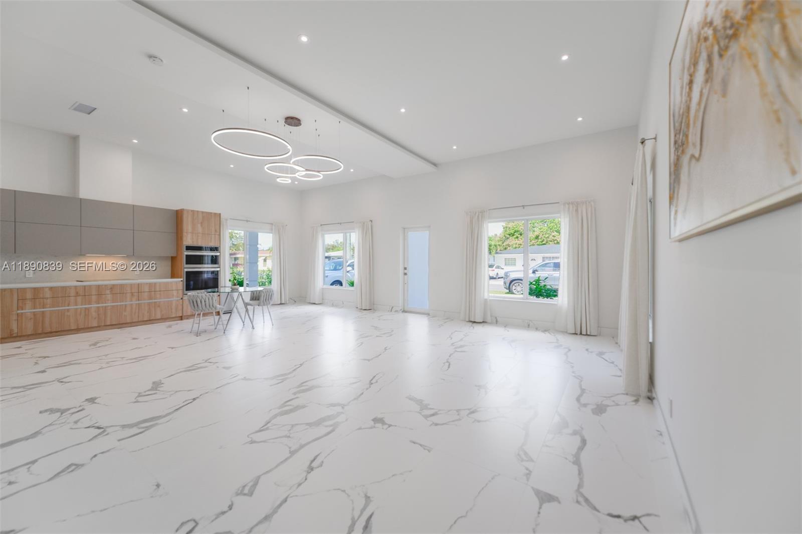 635 Southwest 9th Street Hallandale Beach, FL 33009 - Photo 2 of 38 a view of a kitchen with a sink and a large window