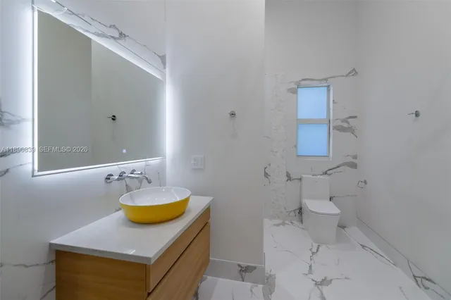 a bathroom with a sink and a bathtub