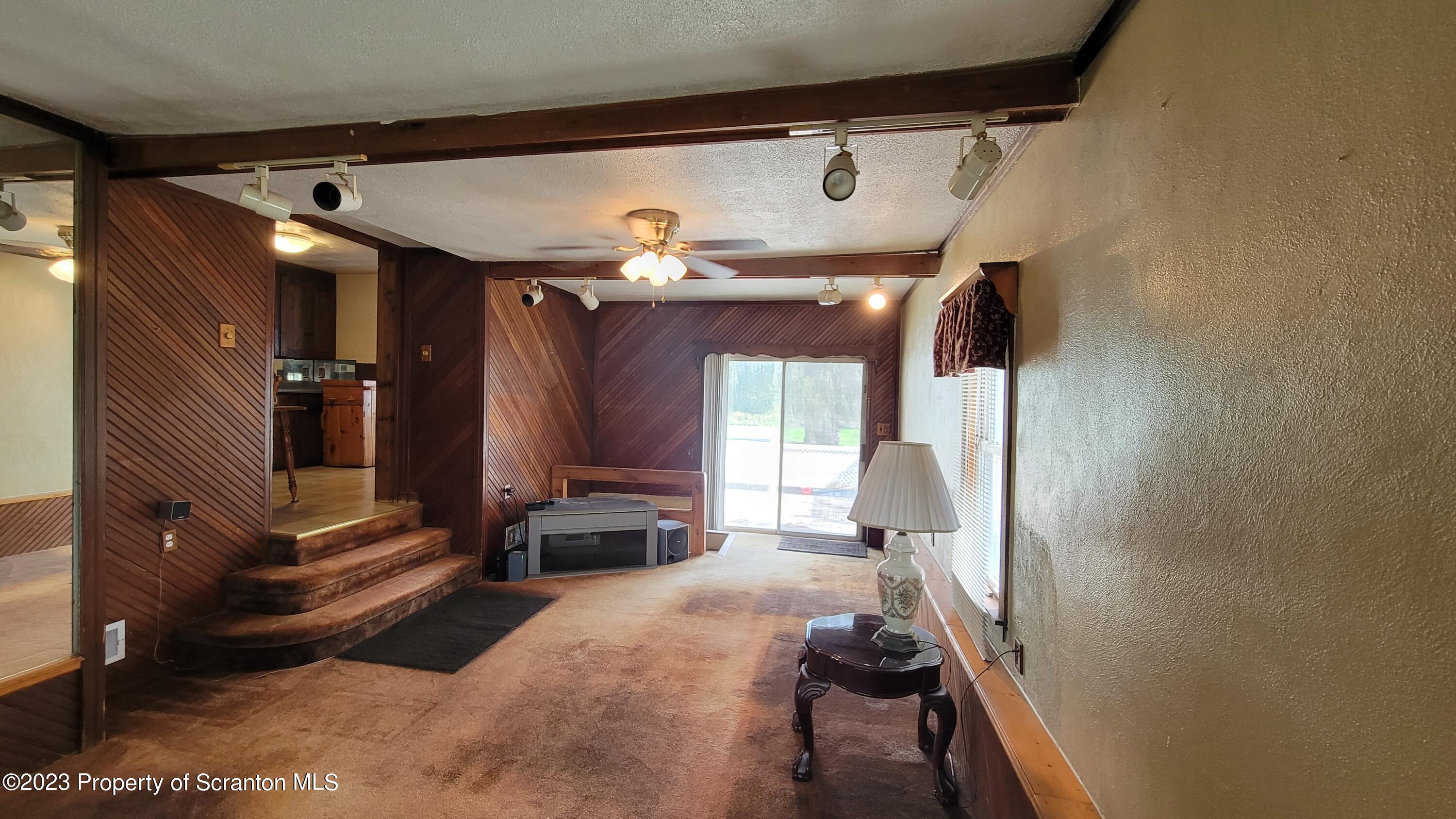 14 Main Street Hallstead, PA 18822 - Photo 4 of 16 a bed room with a bed and furniture