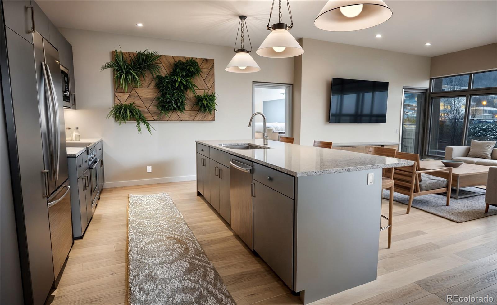 1643 Boulder Street, Unit 210 Denver, CO 80211 - Photo 8 of 17 a kitchen with stainless steel appliances granite countertop a sink a stove and a refrigerator