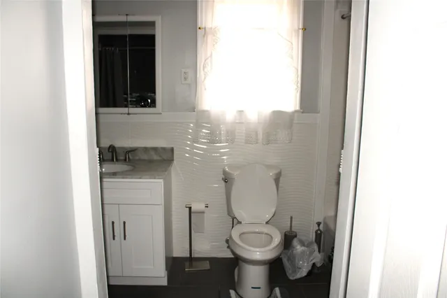 a bathroom with a shower and a tub