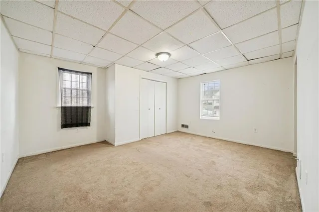 an empty room with windows