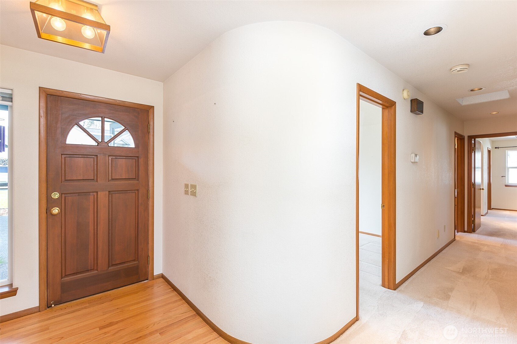 170 Hurricane Ridge Drive Sequim, WA 98382 - Photo 13 of 39 a view of a hallway with wooden floor