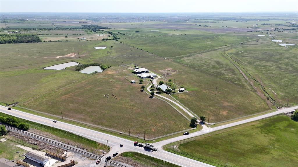 111 Lund Road Elgin, TX 78621 - Photo 13 of 15 a view of a pool in a field