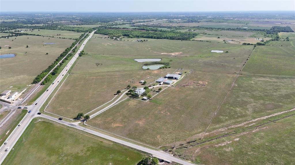 111 Lund Road Elgin, TX 78621 - Photo 3 of 15 an aerial view of house with yard