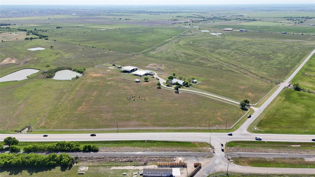 111 Lund Road Elgin, TX 78621 - Photo 4 of 15 a view of a water from a yard