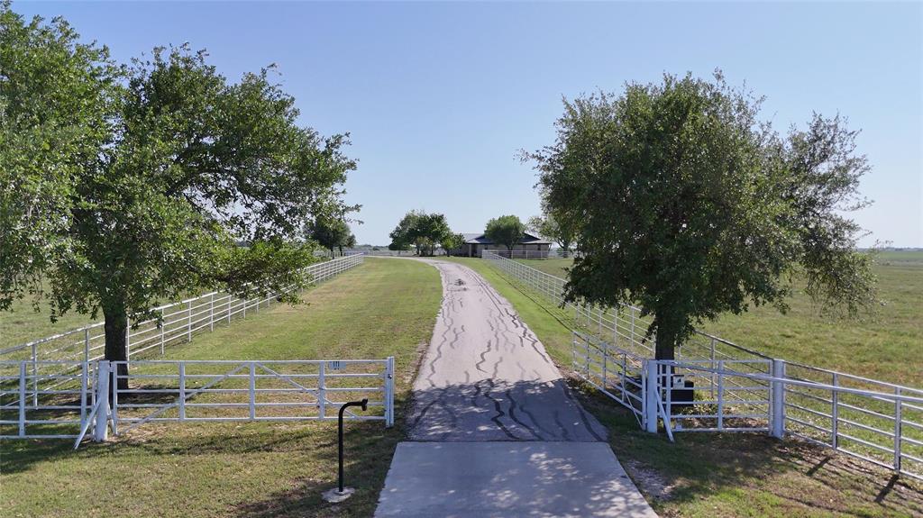 111 Lund Road Elgin, TX 78621 - Photo 5 of 15 a view of a park with large trees