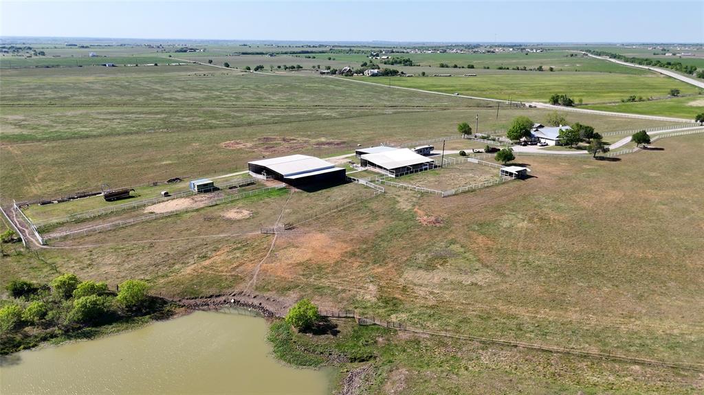 111 Lund Road Elgin, TX 78621 - Photo 9 of 15 a view of a lake with outdoor space