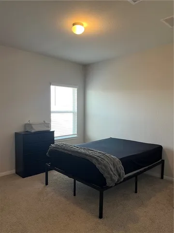 a view of room with cabinets