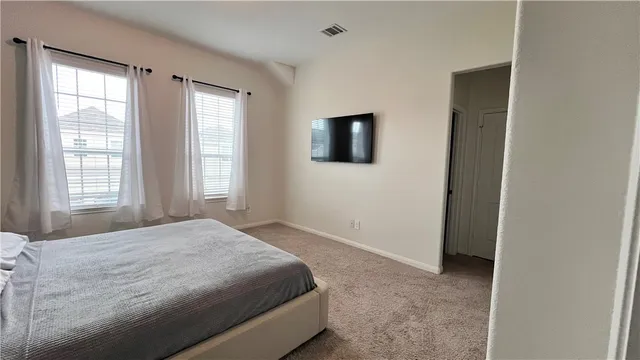 a workspace with furniture and mirror