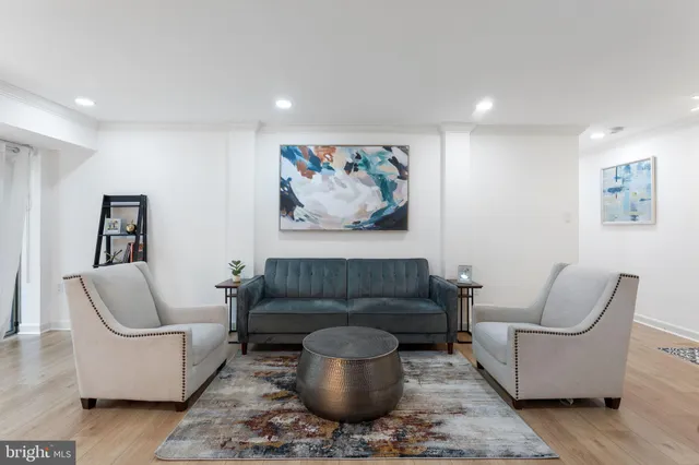 a living room with furniture and a couch