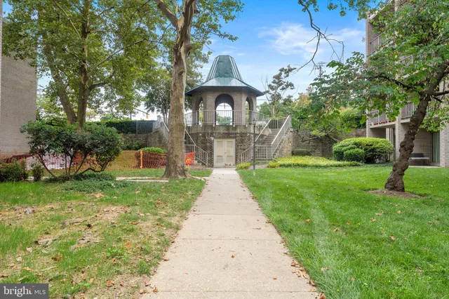 a view of a building with a retail shops and a retail shops