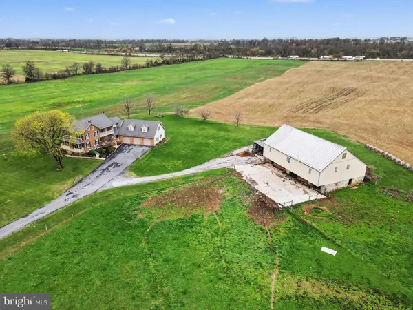 a view of a garden with an ocean