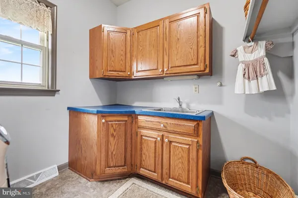 a view of cabinets and window